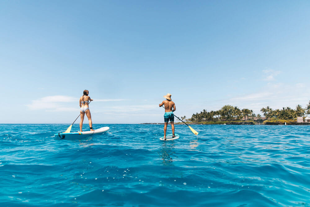 Stand Up Paddleboarding off the coast of the Big Island of Hawaii