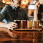 Couple enjoy pau hana at a local brewery